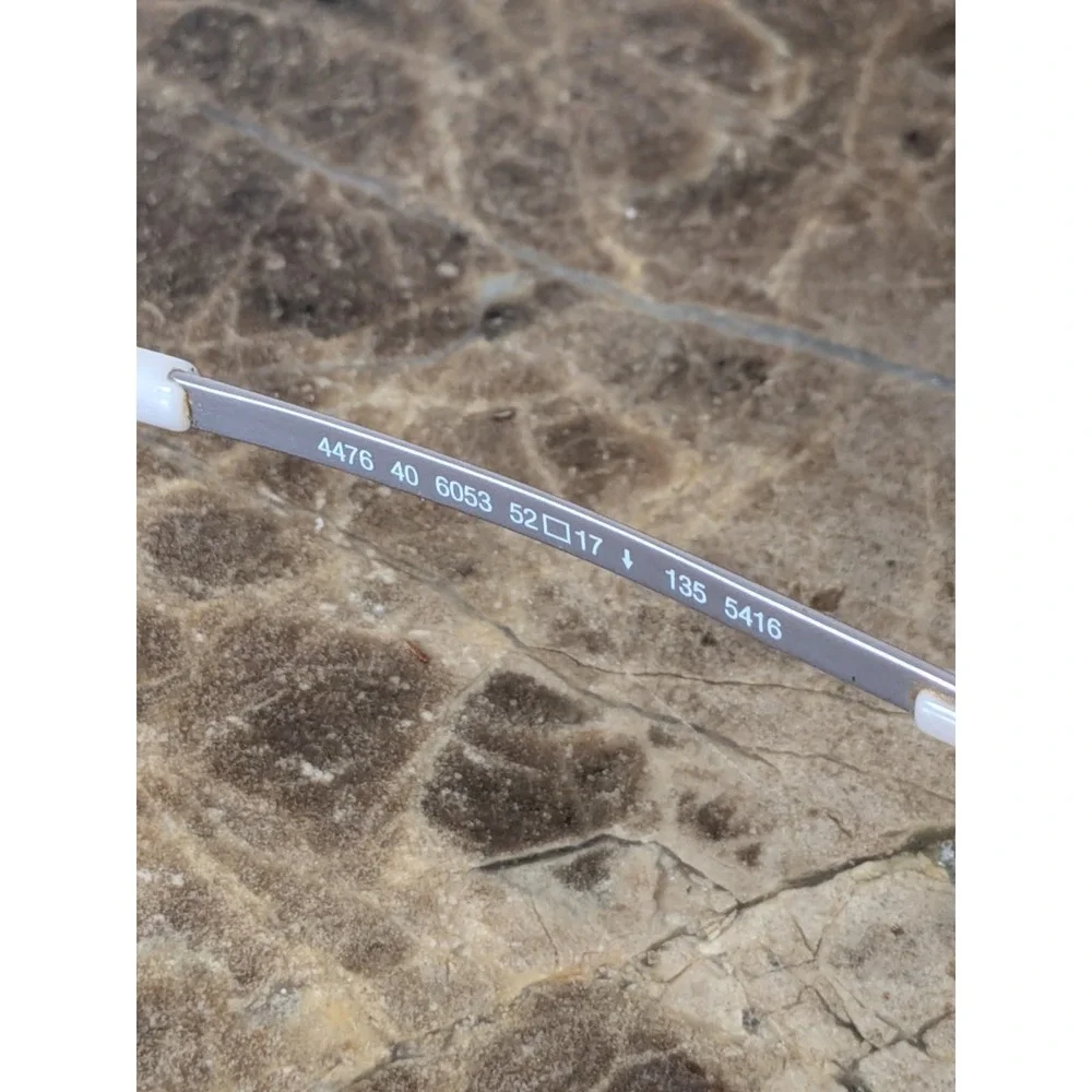 Silhouette Eyeglasses 4476 40 6053 52[]17 135 5416 Titan Creme Rimless Austria
